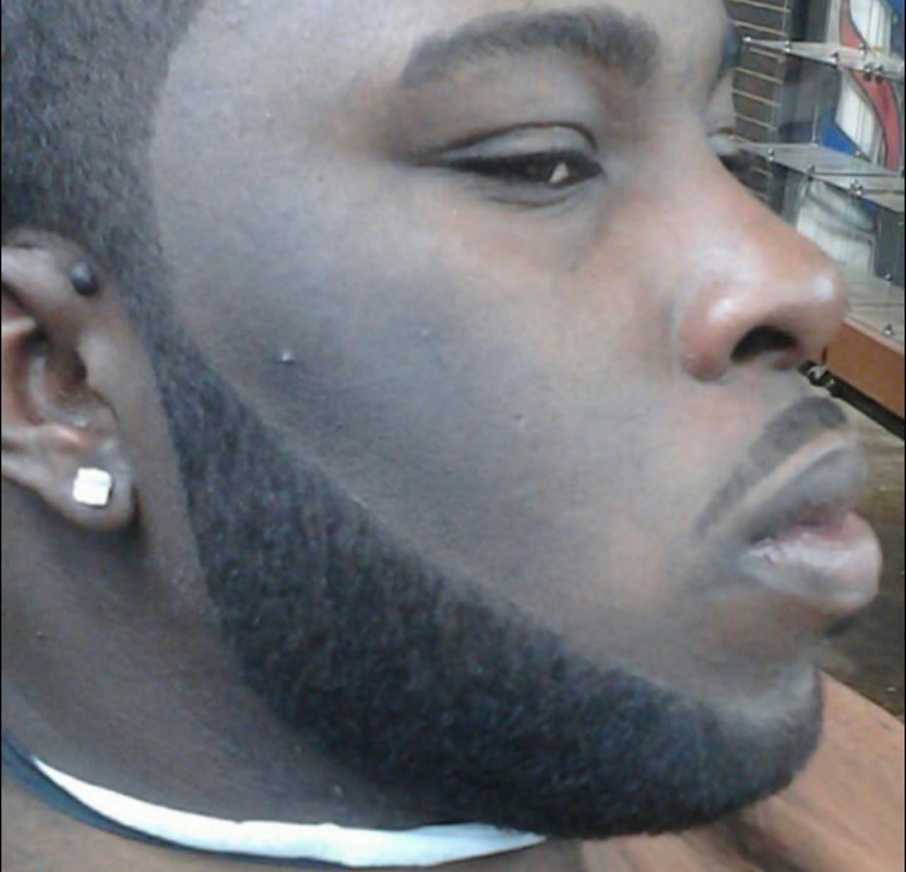 Tight profile of a beard and cheek line finished with a shape-up.